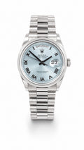 36mm Platinum President with Glacier blue roman dial and new style buckle
